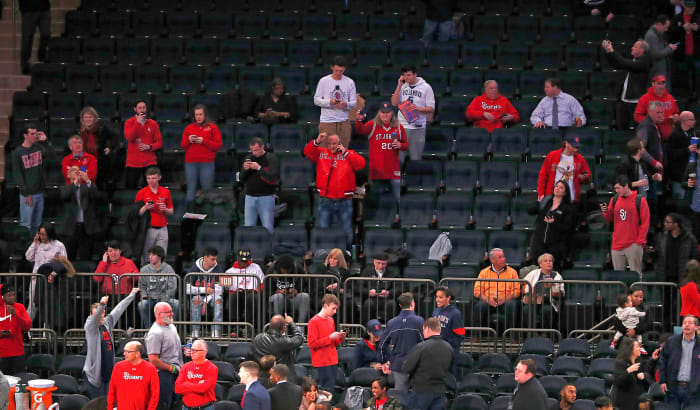 Fans after the mid-game cancellation of the Big East tournament at Madison Square Garden.